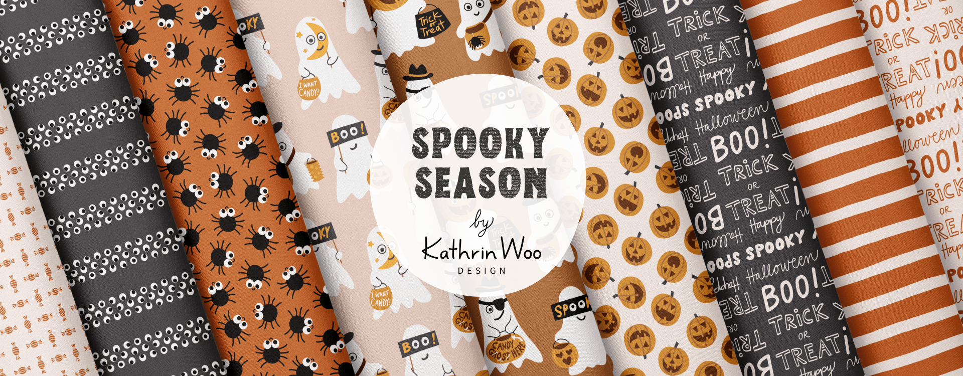 Cute and fun Surface Pattern Design Collection Spooky Season by Kathrin Woo Design displayed on fabric rolls