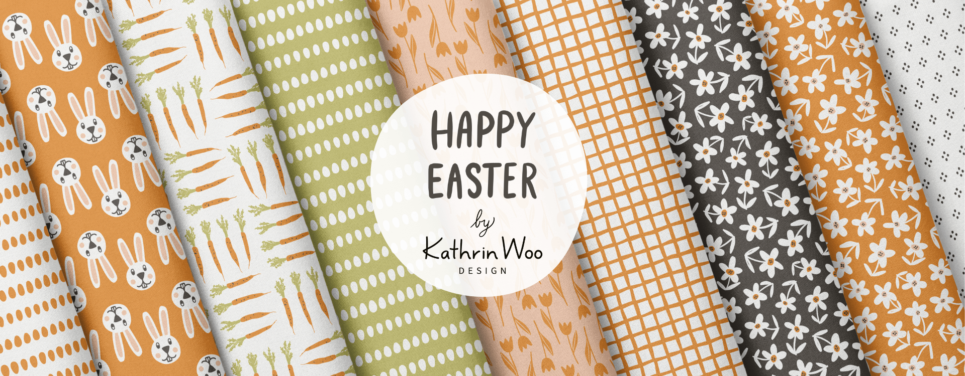 Playful and cute Surface Pattern Design Collection Happy Easter by Kathrin Woo Design displayed on fabric rolls