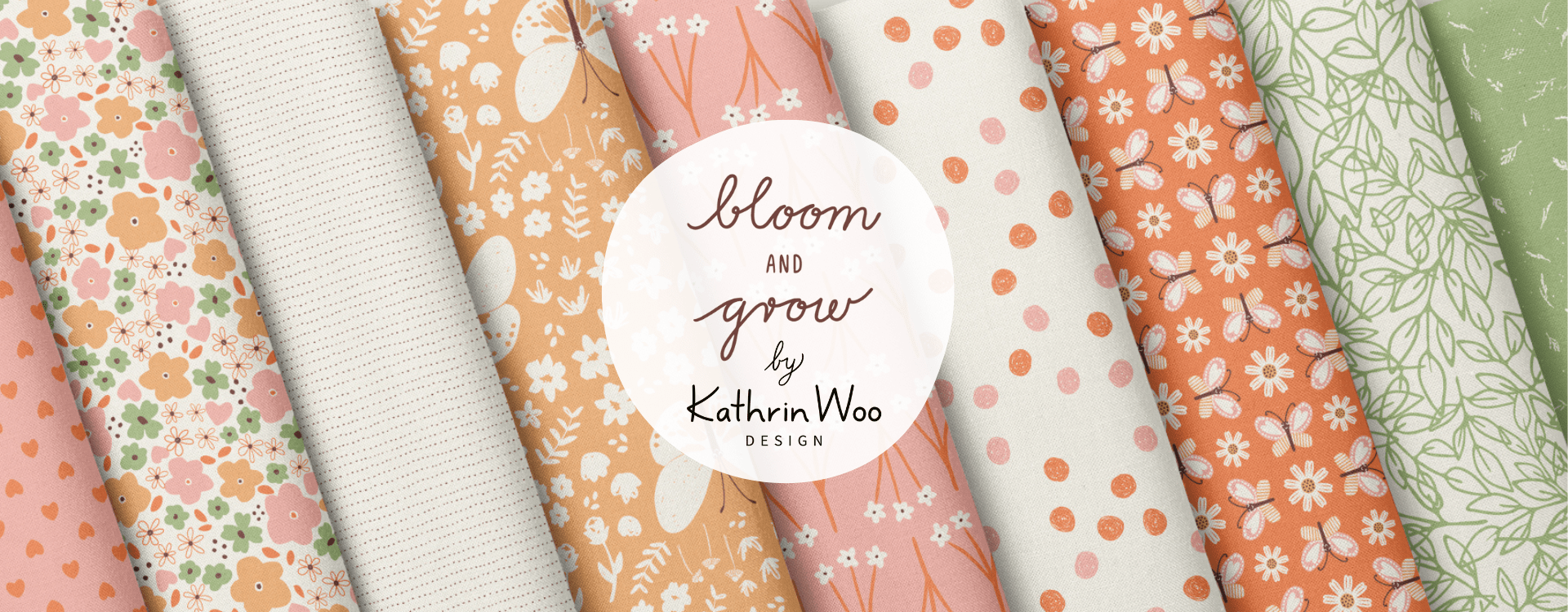 Sweet and delicate Surface Pattern Design Collection Bloom And Grow by Kathrin Woo Design displayed on fabric rolls