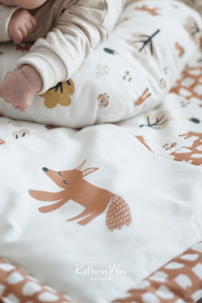 Kathrin Woo Fantastic Fall Surface Pattern Design Collection on a finished product, a baby blanket