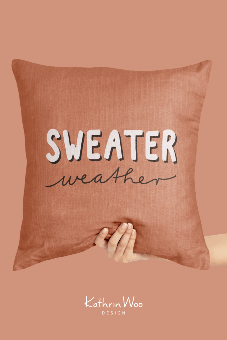 Modern Lettering Design Sweater Weather by Kathrin Woo Design on a pillow