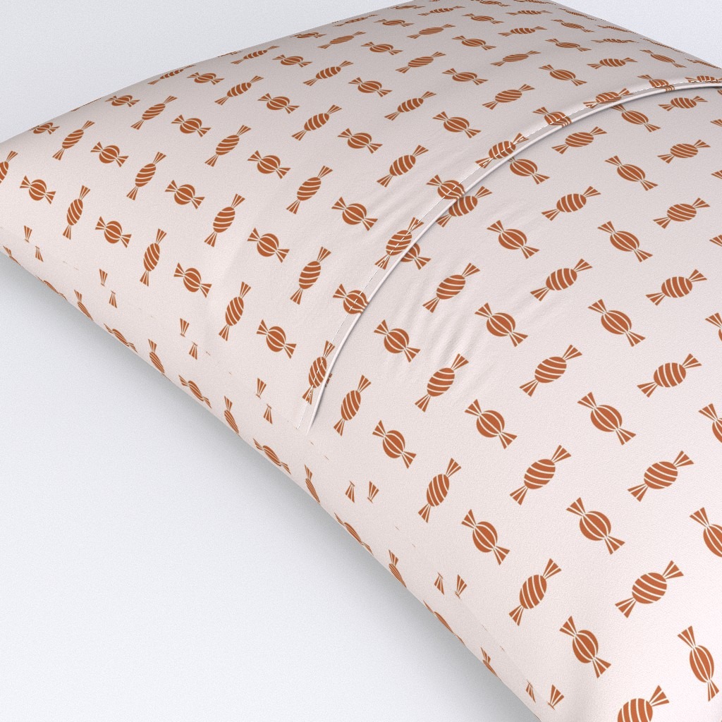 Graphic geometric Halloween surface pattern design Candy from Kathrin Woo's Halloween Collection Spooky Season displayed on a pillow available at Spoonflower