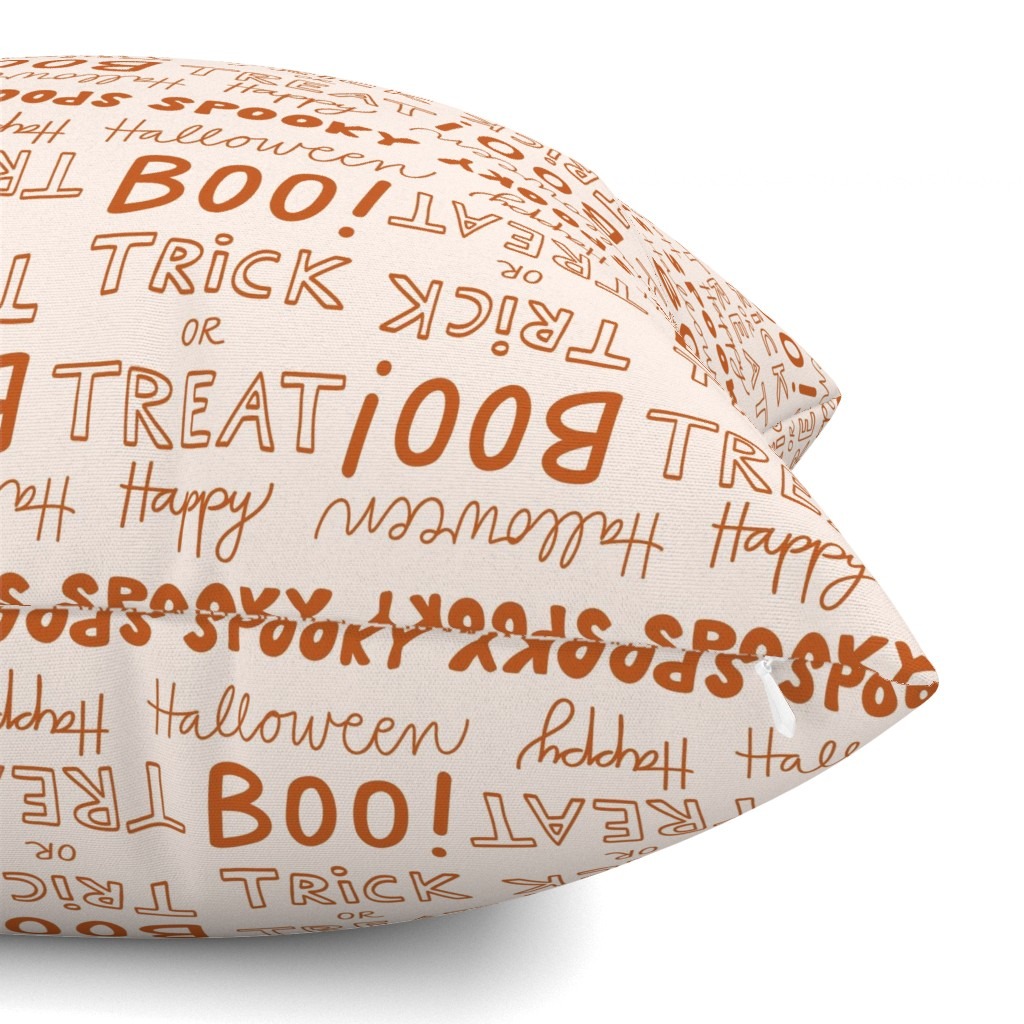 Lettering and typography Halloween surface pattern design Halloween Sayings from Kathrin Woo's Halloween Collection Spooky Season displayed on a pillow from Spoonflower