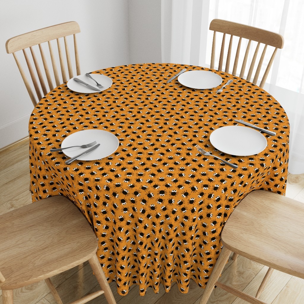 Cute Halloween surface pattern design Spooky Spiders from Kathrin Woo's Halloween Collection Spooky Season displayed on a tablecloth from Spoonflower