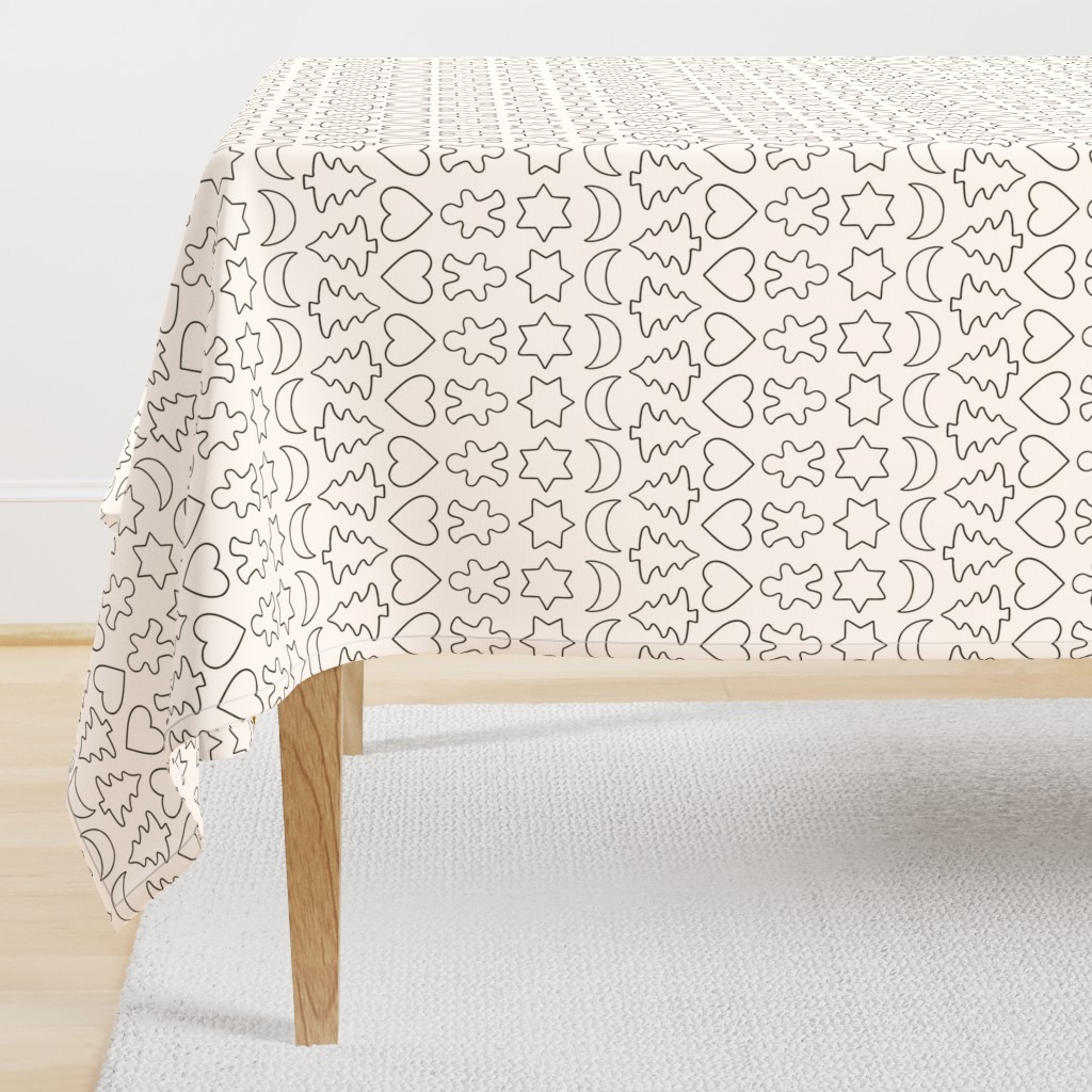 Graphic geo wintery minimal line surface pattern design Cookie cutters from Kathrin Woo's Christmas Winter Collection Cozy Christmas on tablecloth.