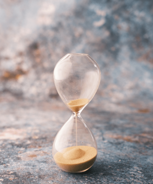 Hourglass symbolizing time management tips and productivity hacks for creative entrepreneurs.