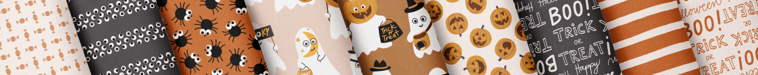 Surface pattern design collection Spooky Season by Kathrin Woo on bolt fabric mockup for licensing.