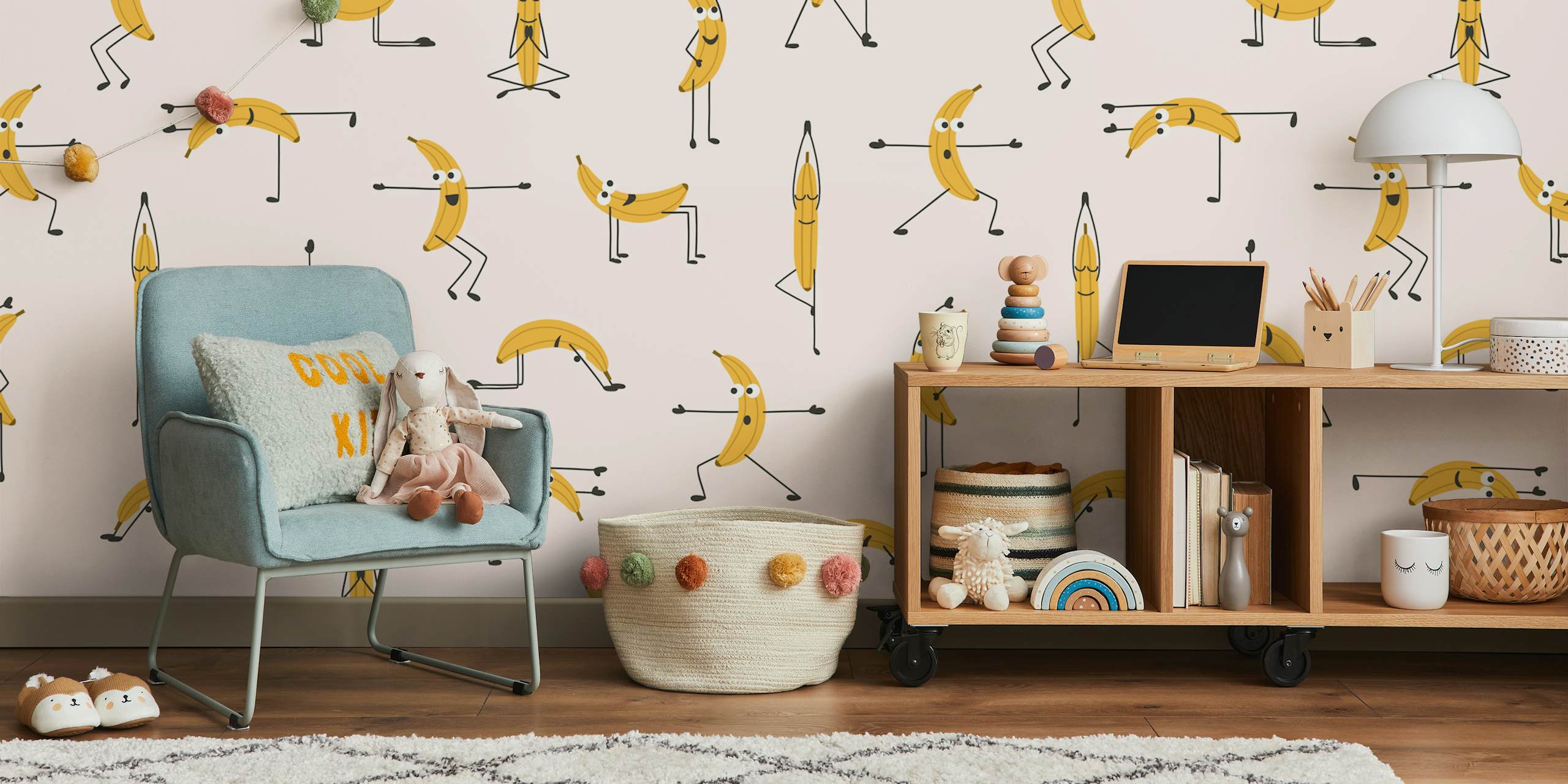 Whimsical banana yoga wallpaper in a playful kids playroom